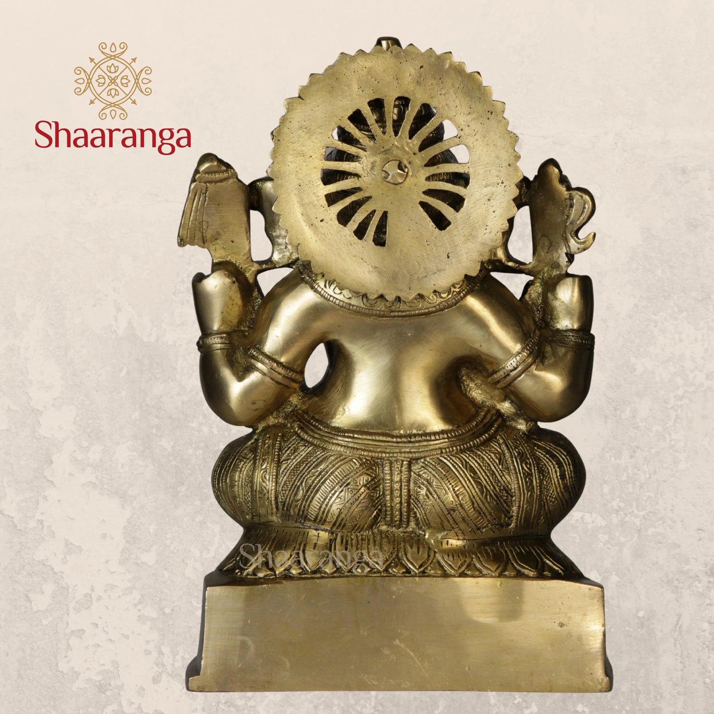 11 Inches Brass Ganesha Idol Sitting On Base.