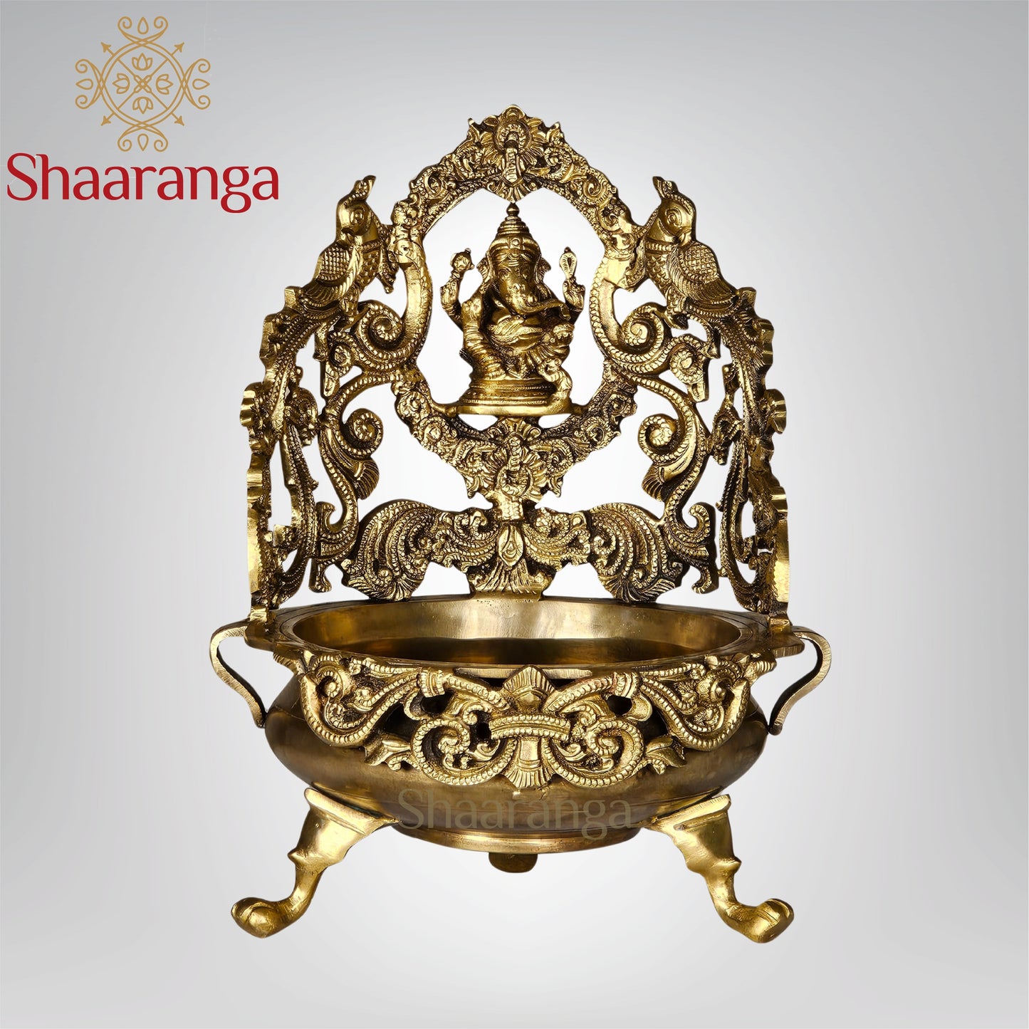 13 Inches Bronze Ganesh Urli with Intricate Peacock Design