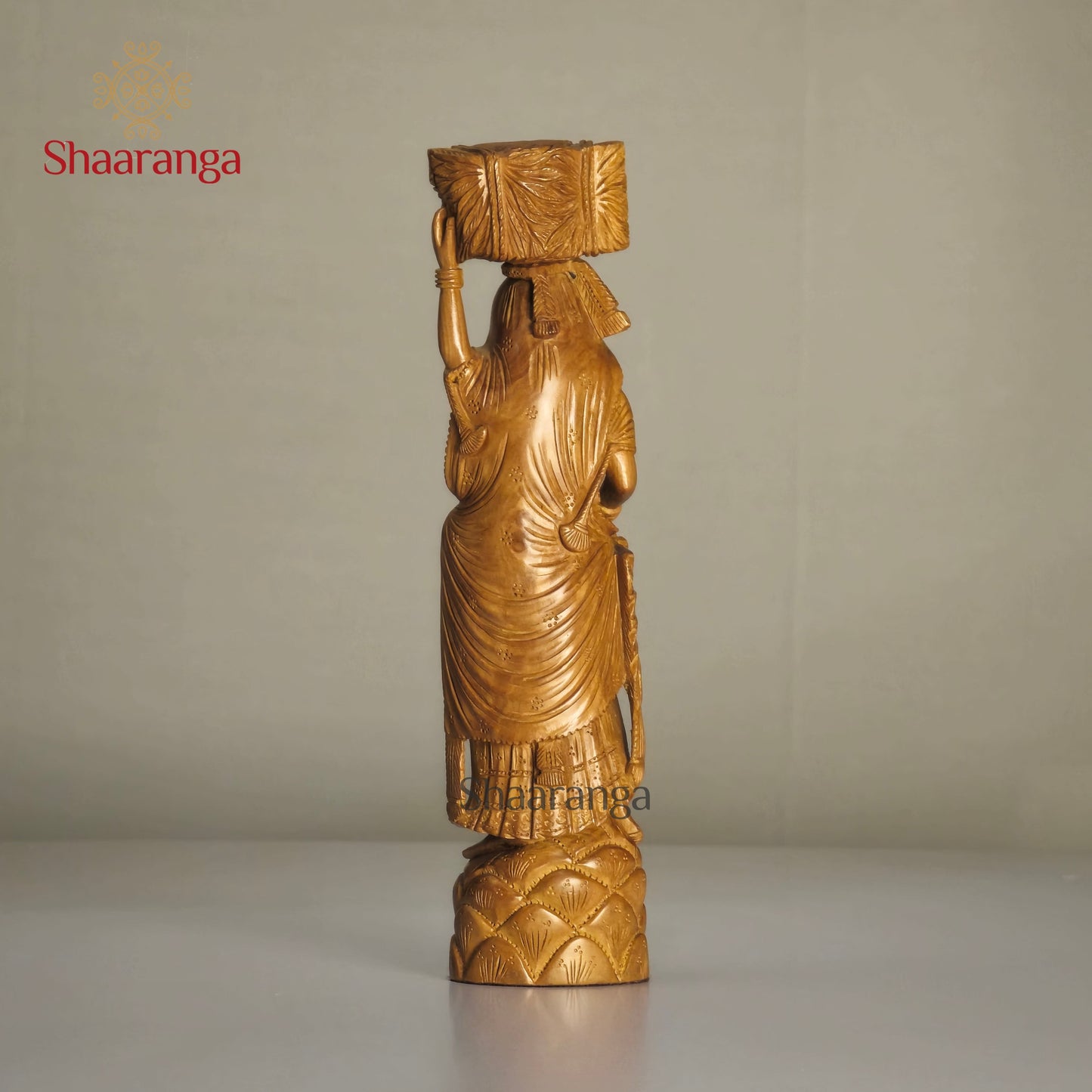 8-inch finely carved sandalwood figurine of a village lady carrying harvest