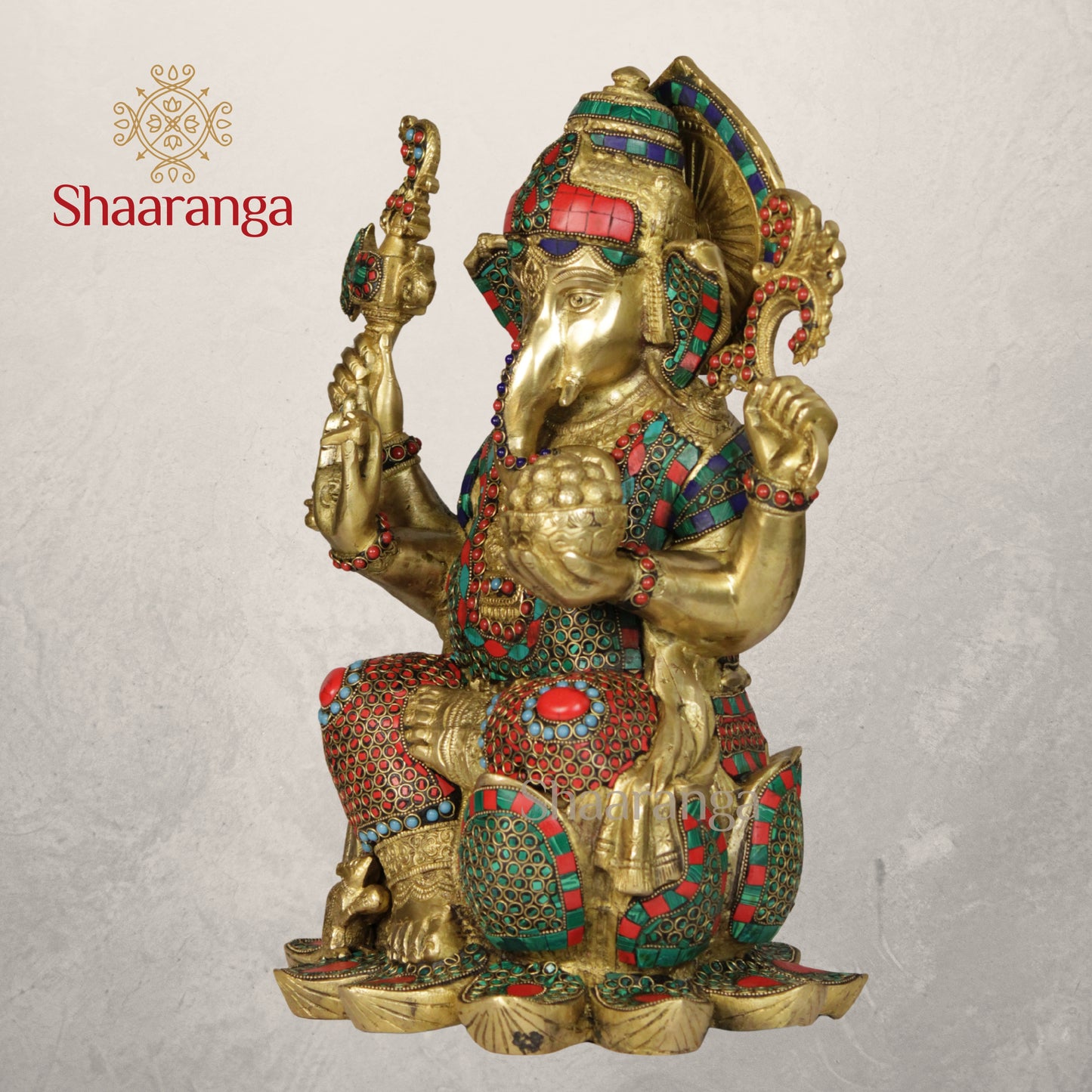 17 Inches Brass Ganesha Idol Sitting On Lotus with Stone work.