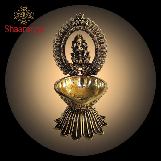4.5 inches Fine Brass Lakshmi with Arch Diya – Divine Radiance in Auspicious Form