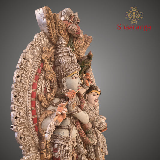 Radha–Krishna with Ornate Arch | Monumental Wooden Sculpture (85 × 57 Inches)