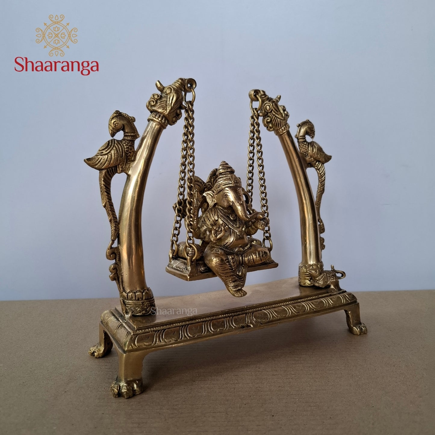 10 Inches Brass Ganesha in Peacock Swing