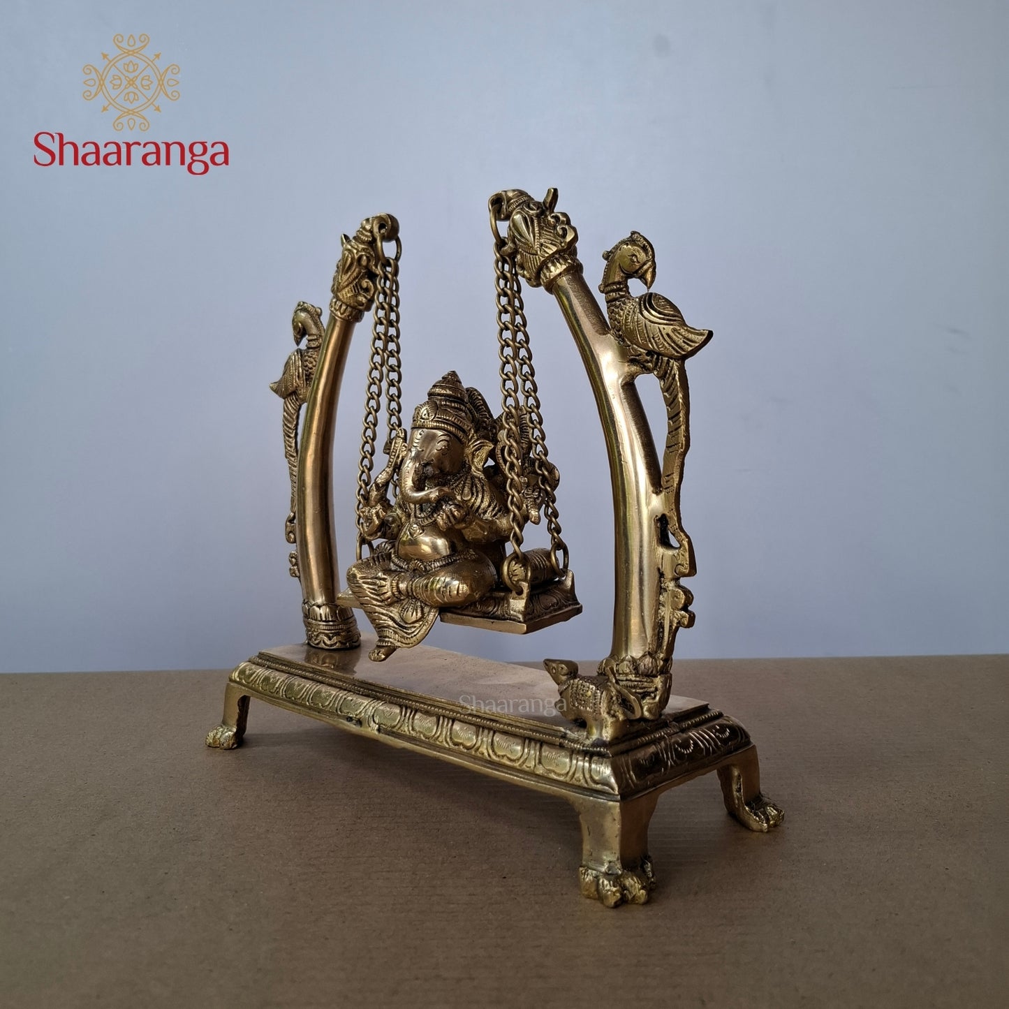 10 Inches Brass Ganesha in Peacock Swing