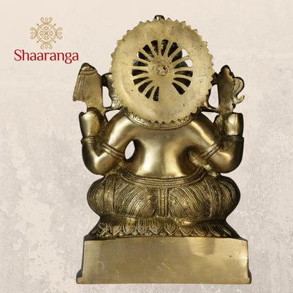 11 Inches Brass Ganesha Idol Sitting On Base.