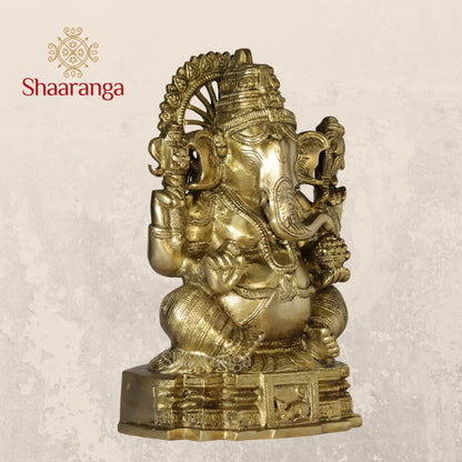 11 Inches Brass Ganesha Idol Sitting On Base.
