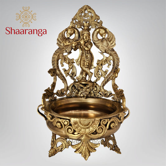 18 Inches Bronze Krishna Urli with intricate Peacock design