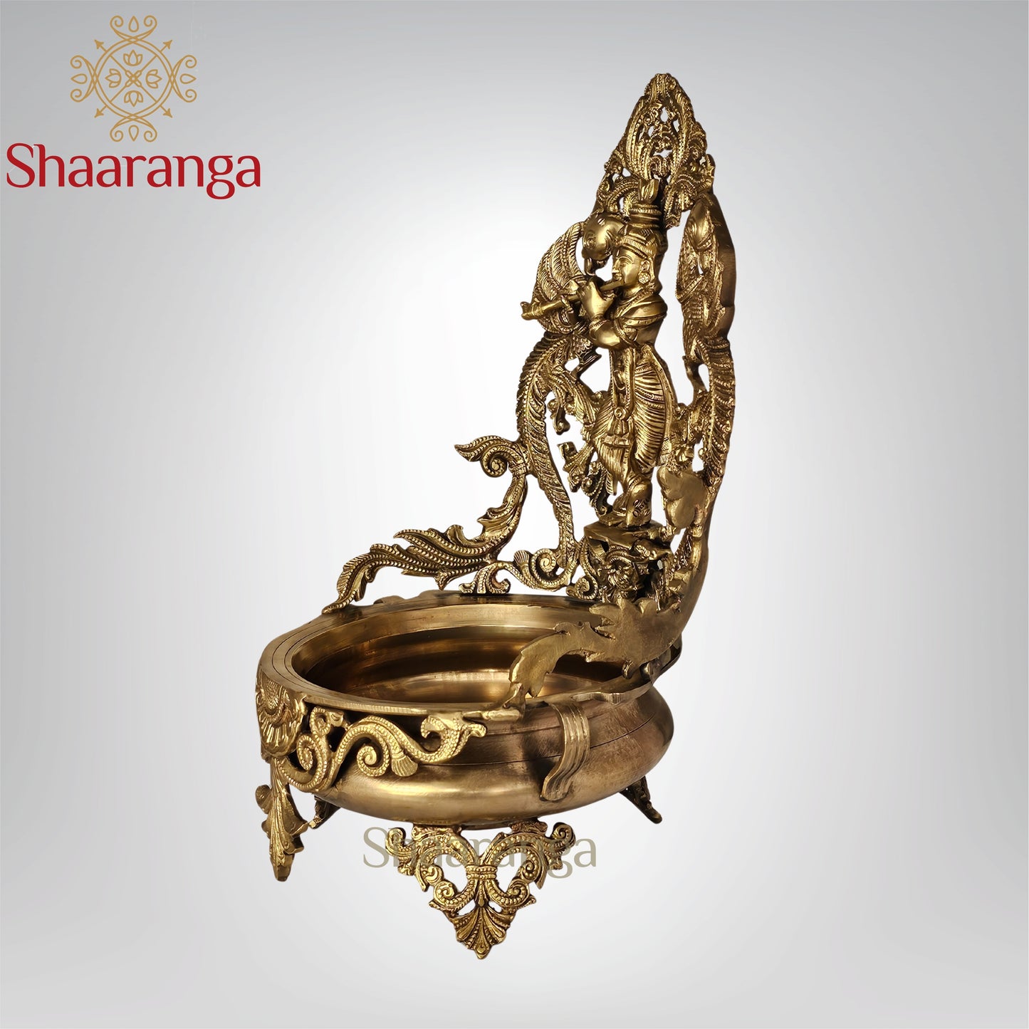 18 Inches Bronze Krishna Urli with intricate Peacock design