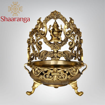 13 Inches Bronze Ganesh Urli with Intricate Peacock Design