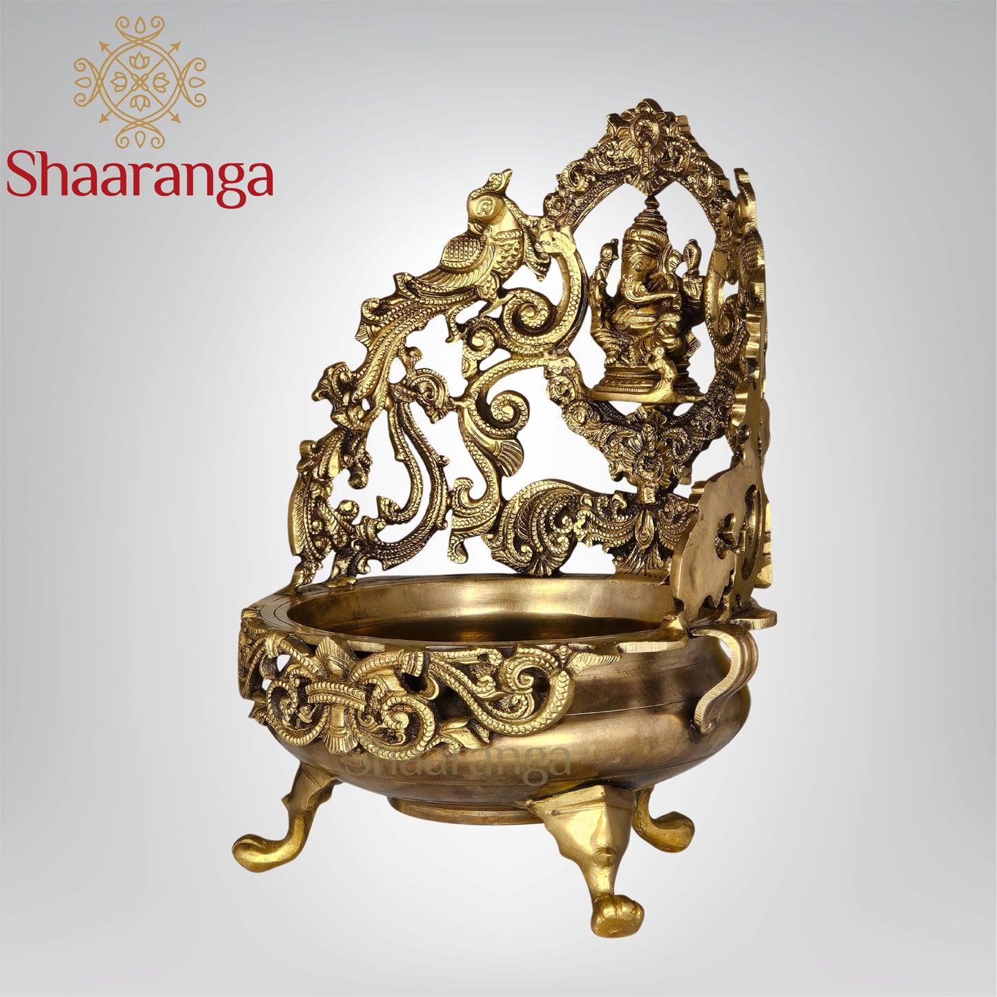 13 Inches Bronze Ganesh Urli with Intricate Peacock Design