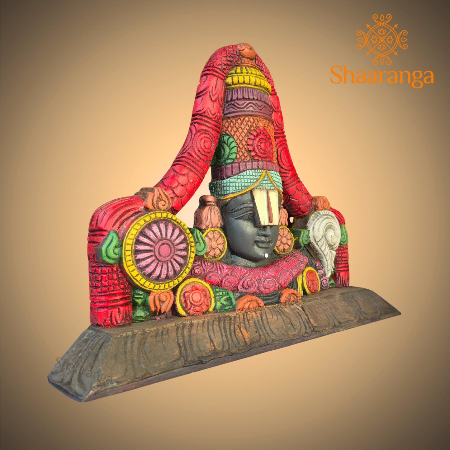 A 12-inch wooden painted bust of Sri Venkateshwara Swamy