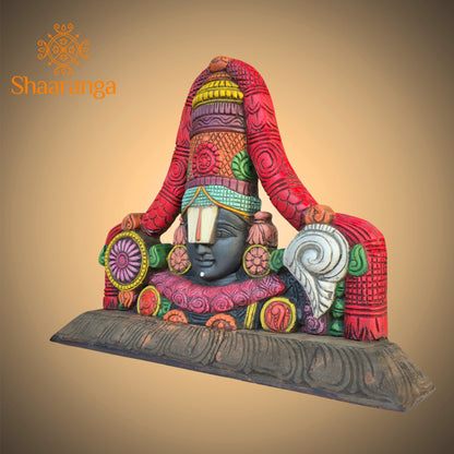 A 12-inch wooden painted bust of Sri Venkateshwara Swamy