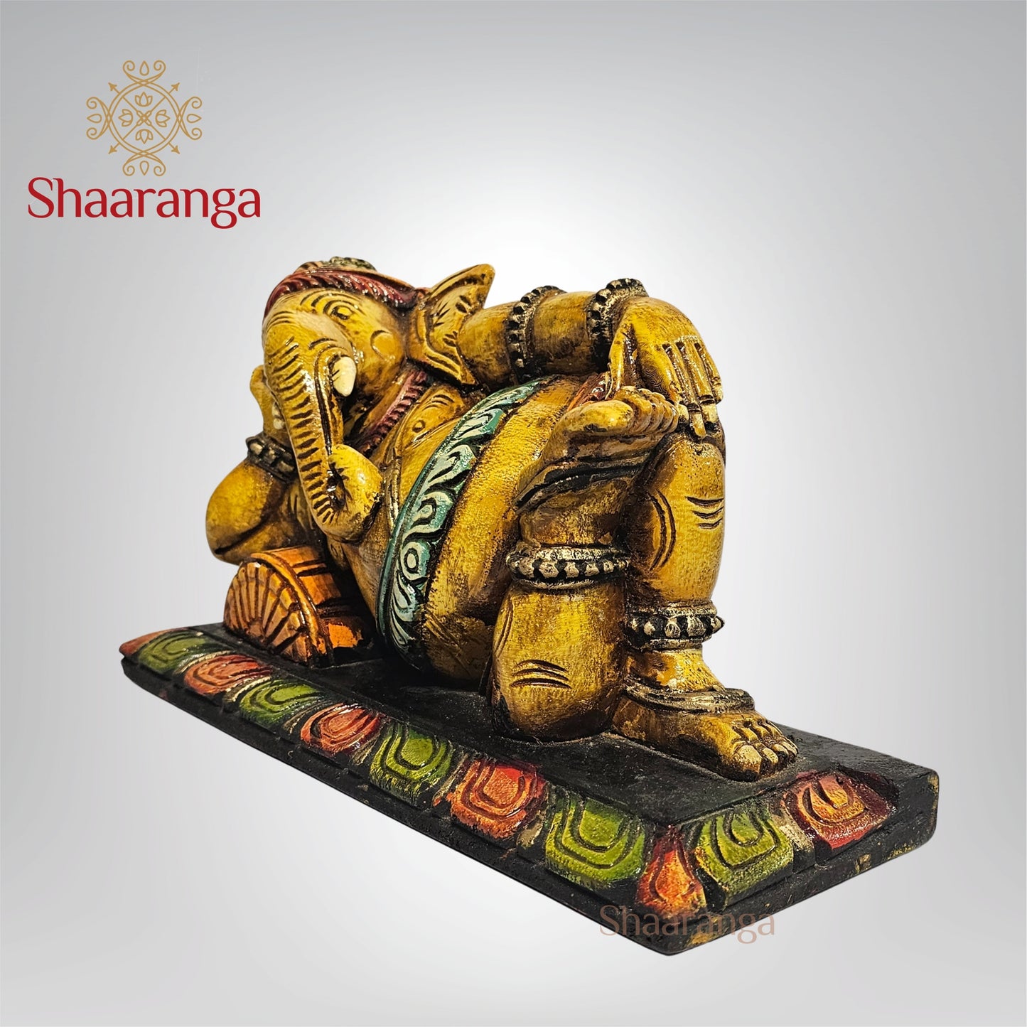 9.5 Inches wooden Relaxing Ganesha with Vibrant Painted Finish
