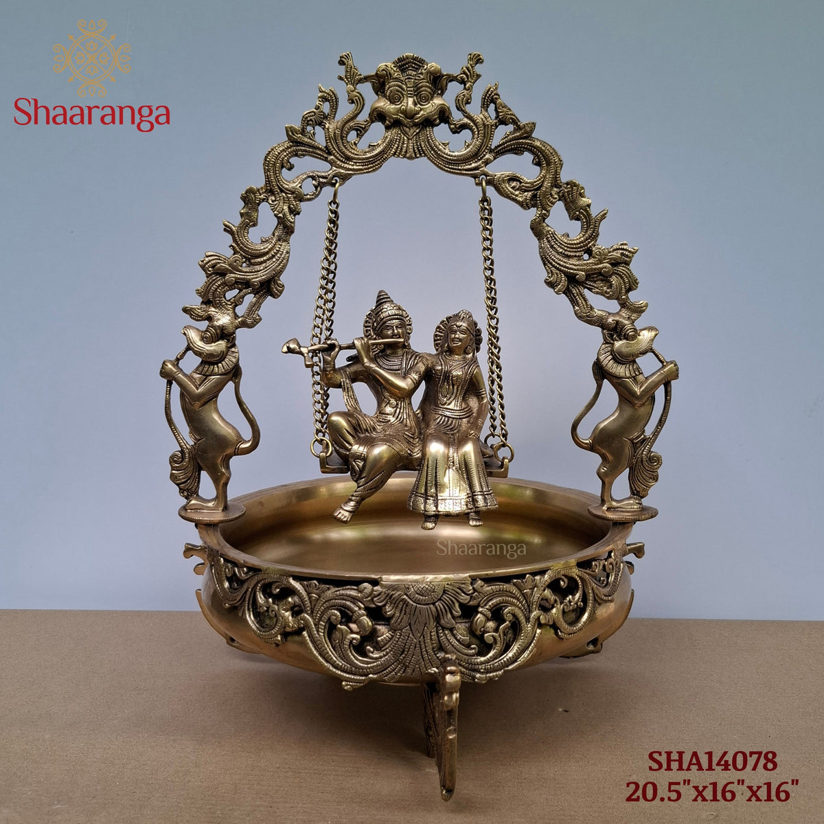 20 Inches Brass Radha Krishna Swing Urli with Ornate Yaali Arch