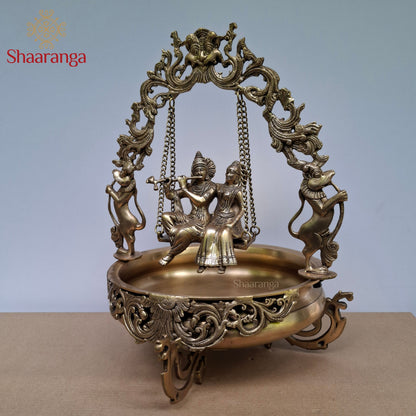 20 Inches Brass Radha Krishna Swing Urli with Ornate Yaali Arch