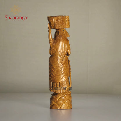 8-inch finely carved sandalwood figurine of a village lady carrying harvest