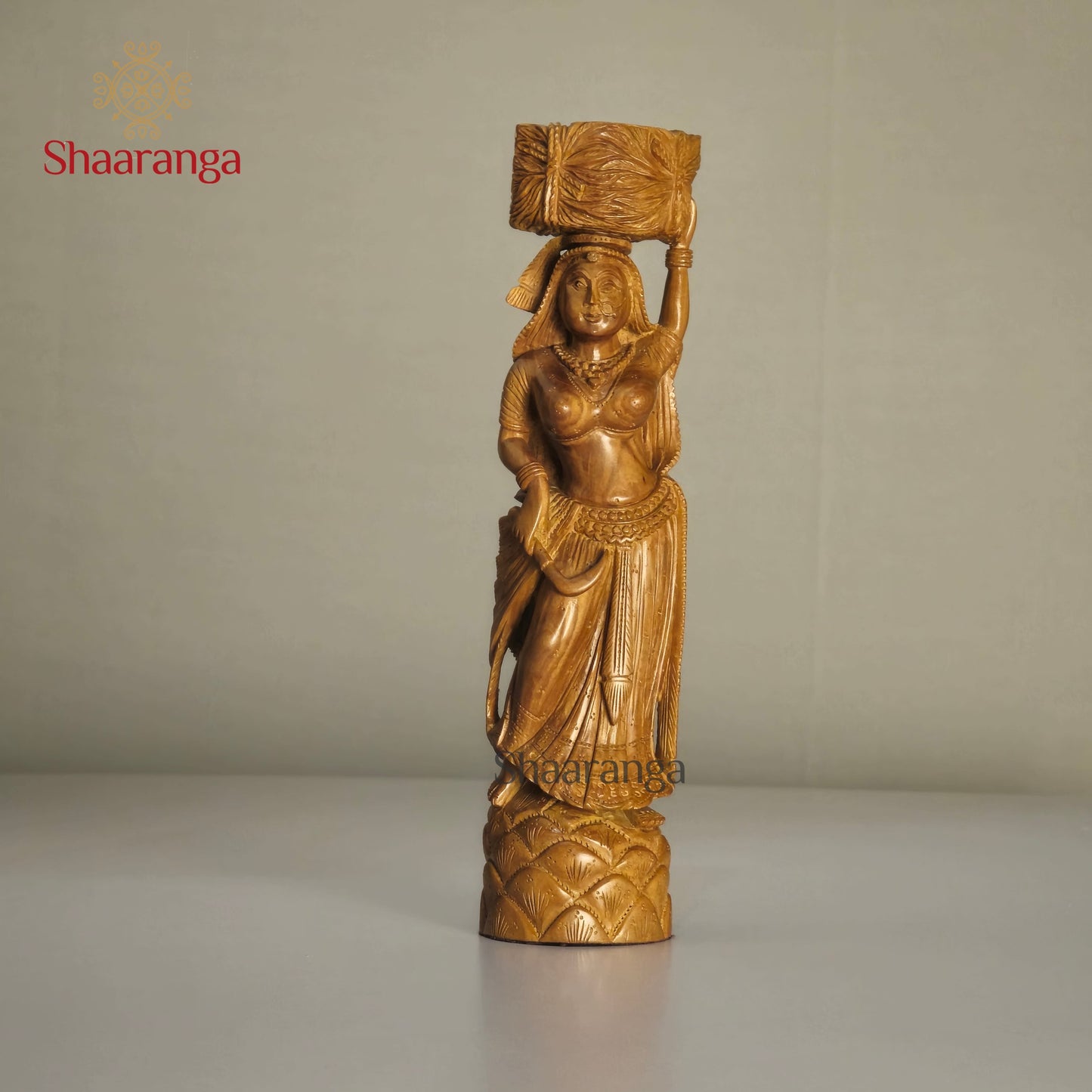 8-inch finely carved sandalwood figurine of a village lady carrying harvest