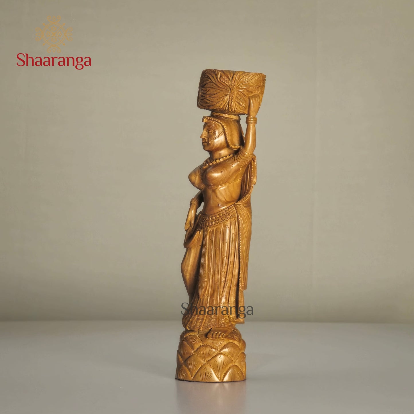8-inch finely carved sandalwood figurine of a village lady carrying harvest