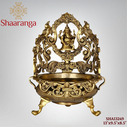 13 Inches Bronze Ganesh Urli with Intricate Peacock Design